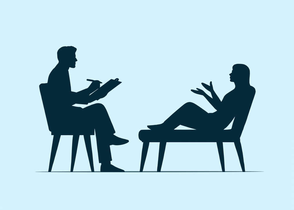 an animated image of a male therapist and a female in the therapy chair